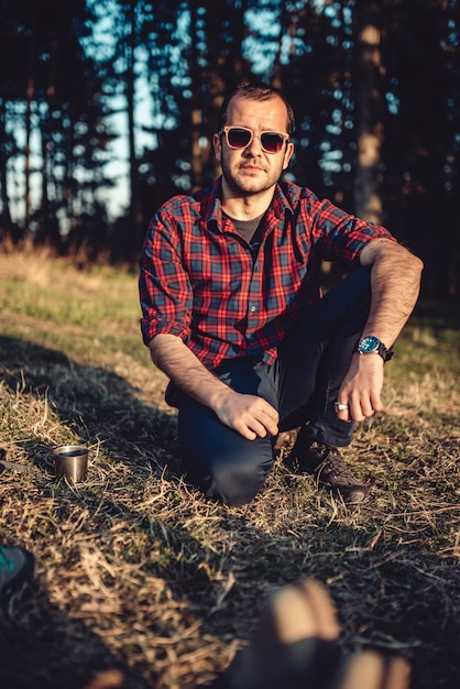 Hiker resting on the grass