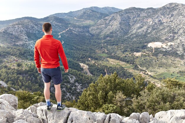 Hiker on the top of mountain