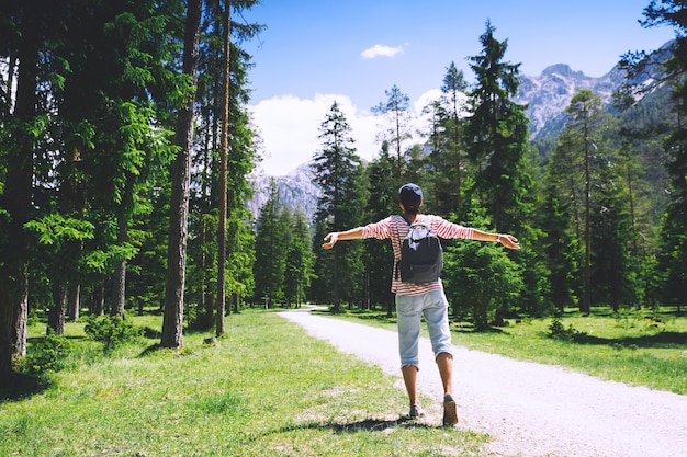 Hiker woman relaxing outdoors on nature Travel at Dolomites Italy Europe Summer holiday