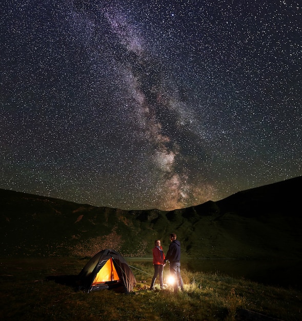 Hikers in the countryside at night