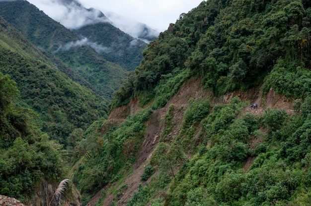 hikers walking in a mountain andes mountain range