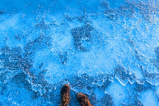 Hiking boots on frozen ground