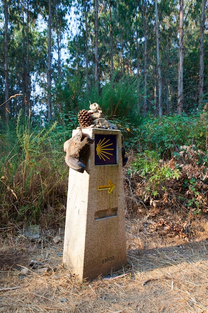 Hiking boots on the stone signal