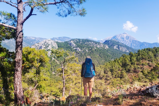 Hiking in famous Lycian Way in the Turkey. Backpacker in the trail.