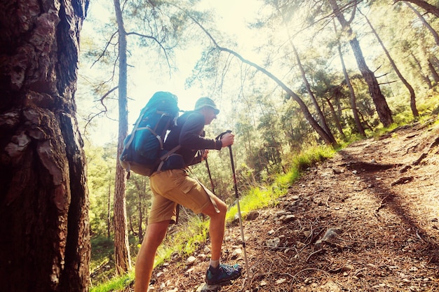 Hiking in famous lycian way in the turkey. backpacker in the trail