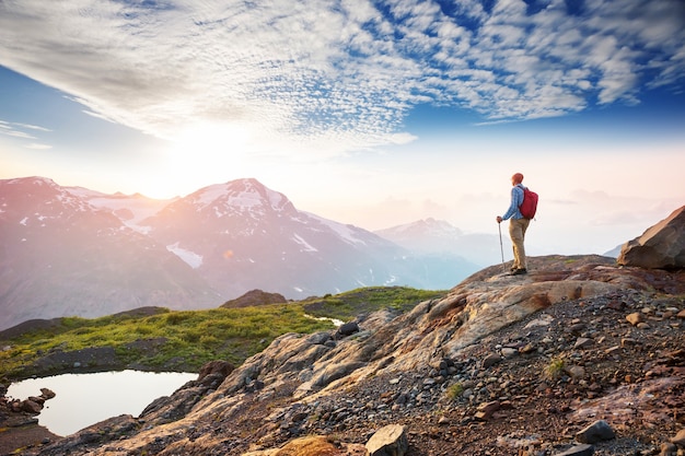 Hiking man in Canadian mountains. Hike is the popular recreation activity in North America.