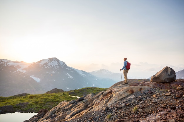 Hiking man in Canadian mountains.