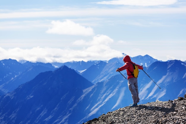 Hiking man in the mountains