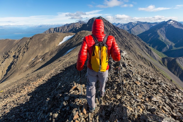 Hiking man in the mountains