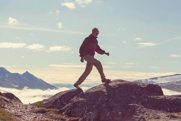 Hiking man in the mountains