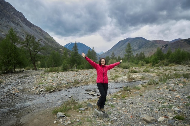 Hiking in the mountains Rivers and mountain lakes summer landscape of ridges and peaks An amazing journey