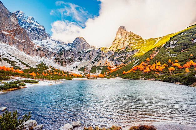 Hiking in national park high tatras hiiking from white lake to\
green lake in the mountain landscape zelene pleso slovakia