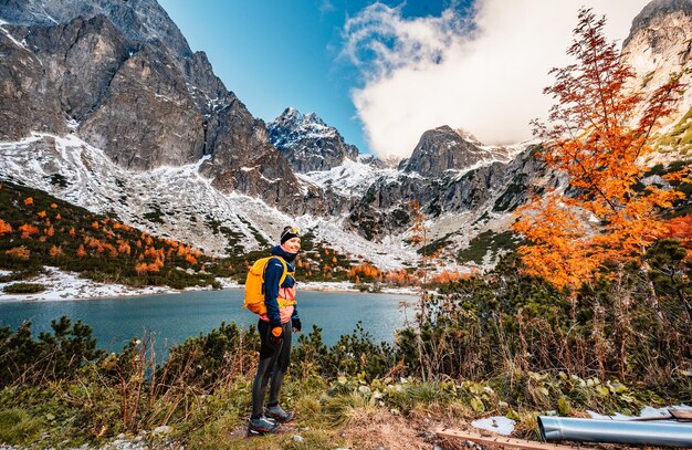 Hiking in national park high tatras hiiking from white lake to\
green lake in the mountain landscape zelene pleso slovakia