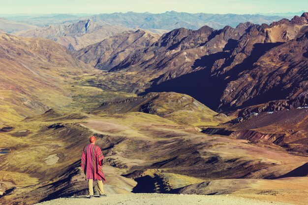 Hiking scene in Vinicunca, Cusco Region, Peru. Montana de Siete Colores,  Rainbow Mountain.