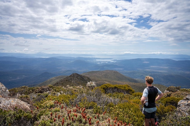 Hiking up to the summit of a rocky mountain in australia