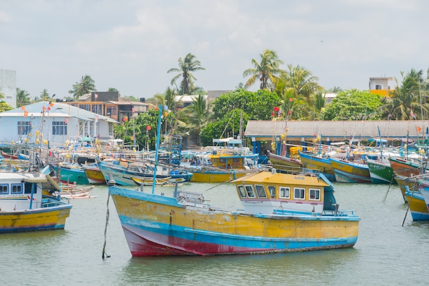 Hikkaduwa, Sri Lanka. Wooden fishing boats on the shore.