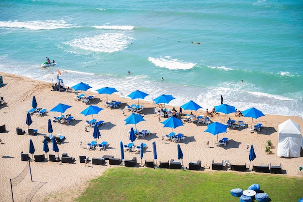 Hilton Alexandria Egypt August 15 2021 A highangle shot of a beach with sun loungers and blue