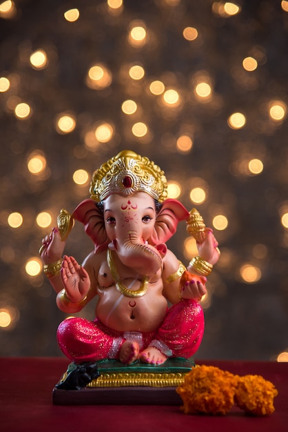 Hindu God Ganesha on Blured bokhe, Ganesha Idol.