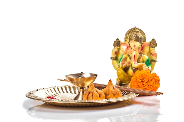 Hindu God Ganesha. Statue of Lord Ganesha. Worship (Pooja) arrangement.