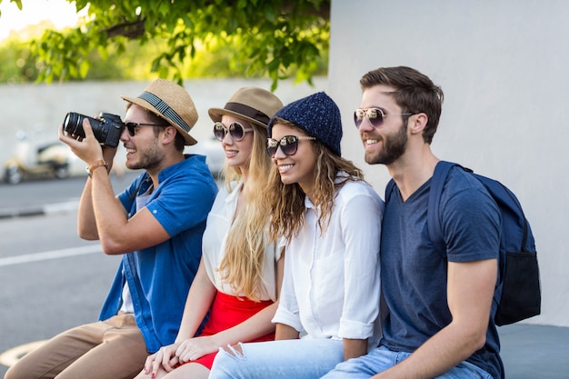 Hip friends taking a picture in the streets