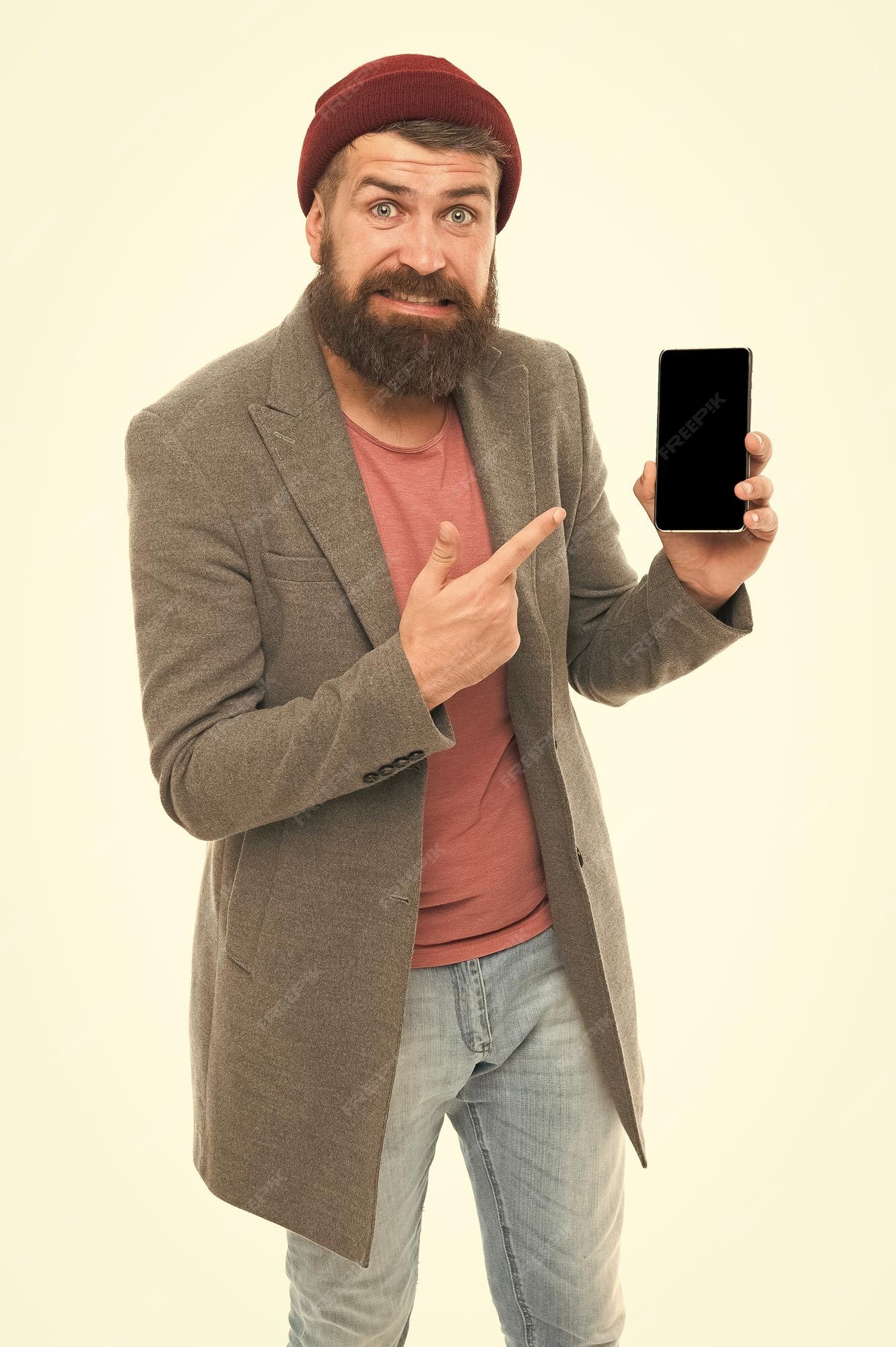 Mobile gadget dependence. Man bearded hipster play smartphone