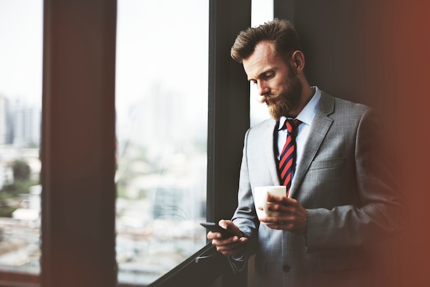 Hipster businessman working on project 