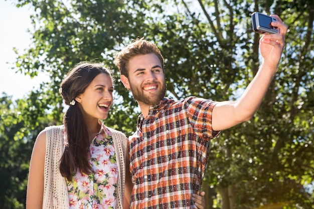 Hipster couple taking a selfie