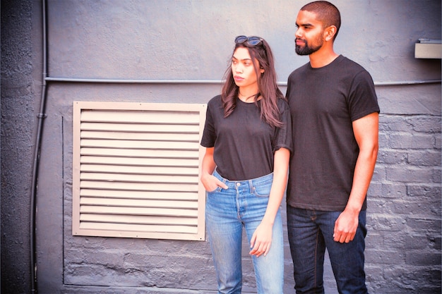 Photo hipster couple with blank t-shirts for your design