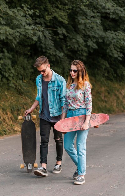 Hipster Couple with Boards