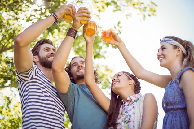 Hipster friends having a beer together