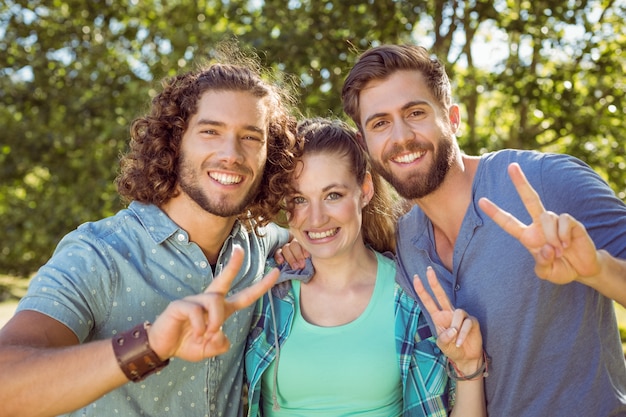 Hipster friends smiling at camera