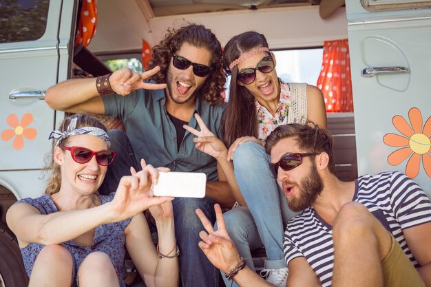 Hipster friends taking a selfie