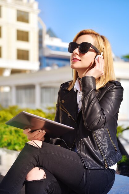 Hipster girl listening to music