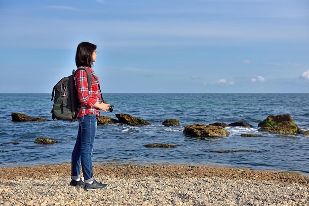 Hipster girl with camera