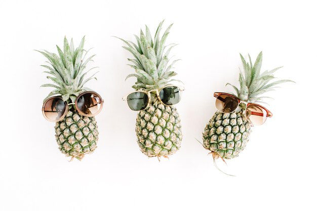 Hipster pineapples in sunglasses