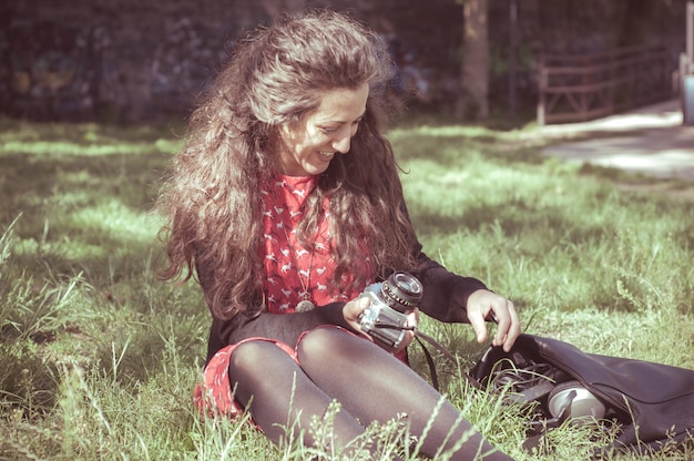 hipster vintage woman with old camera