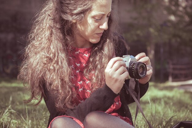 hipster vintage woman with old camera