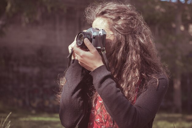 Photo hipster vintage woman with old camera