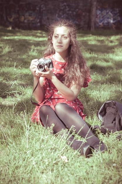 hipster vintage woman with old camera