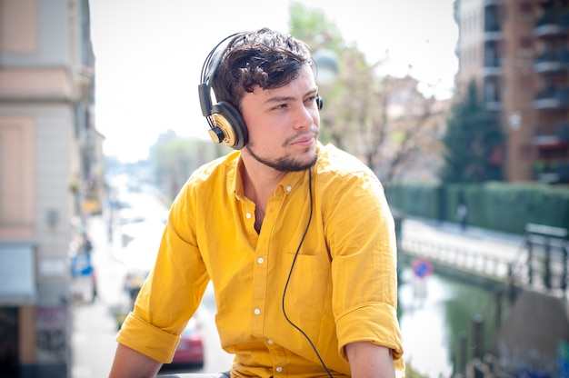 hipster young man listening to music