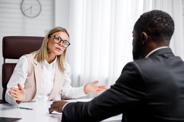 Photo hiring interview refusal to work due to racism business woman refuses to hire an african american he