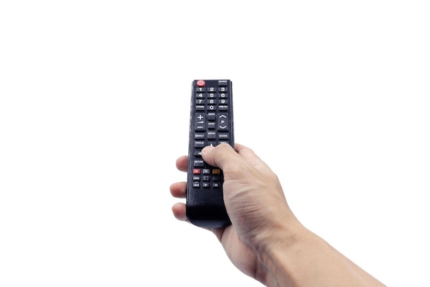 Photo his hand is holding the remote control and operate the remote control on the white background