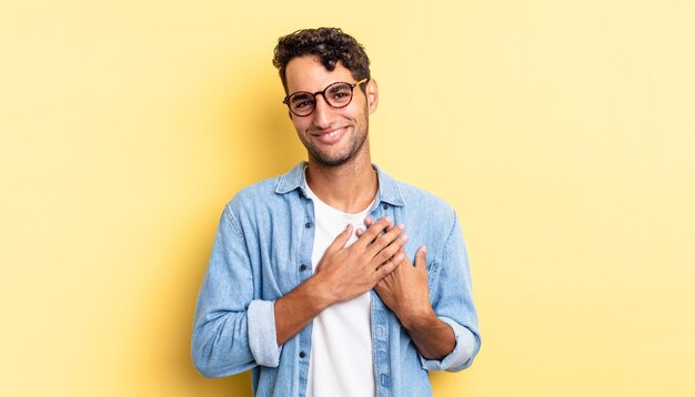 Hispanic handsome man feeling romantic, happy and in love