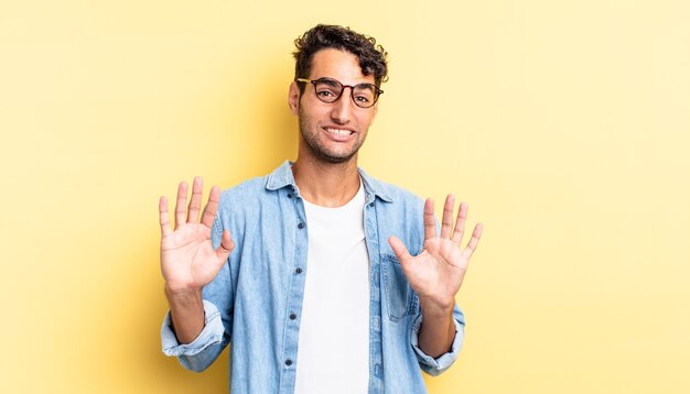 Hispanic handsome man looking nervous, anxious and concerned