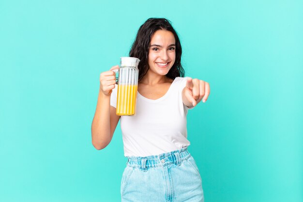 Hispanic pretty chef woman. orange juice concept