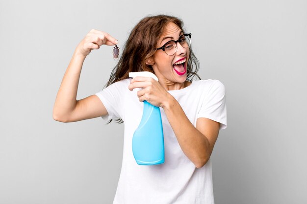 Hispanic pretty young woman holding a cockroach disease concept