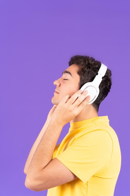 Hispanic teenager boy listening to music