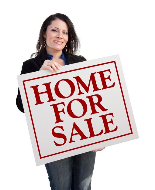 Hispanic Woman Holding Home For Sale Real Estate Sign