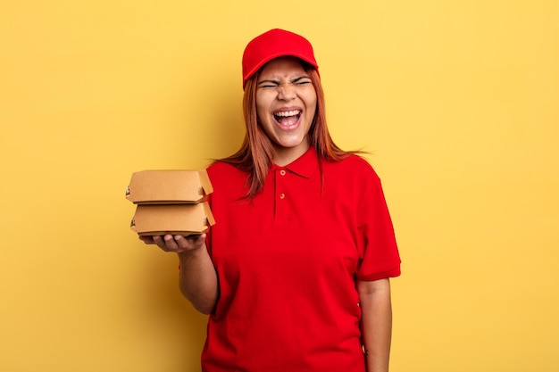 Hispanic woman shouting aggressively, looking very angry. take away deliver concept