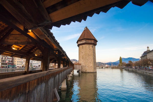 Historic city center with its famous Chapel Bridge and Mt. Pilatus on the background